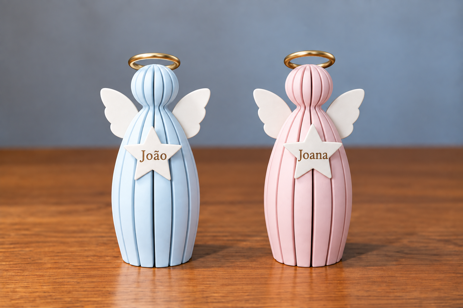 Anjos azul e rosa com os nomes João e Joana na estrela